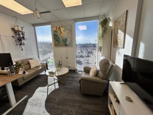 Cozy and welcoming therapy room at Calgary Mental Health & Wellness Centre, offering a calm space for a supportive counselling experience.